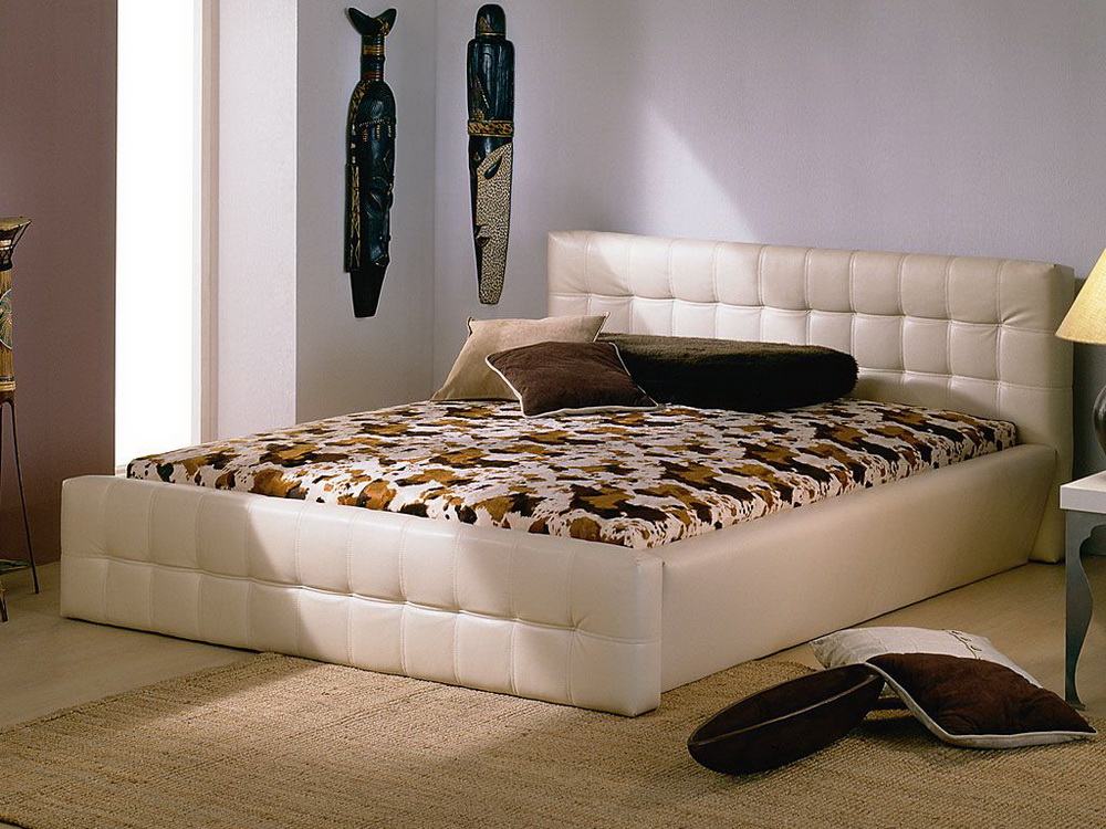 Lit avec tête de lit moelleuse