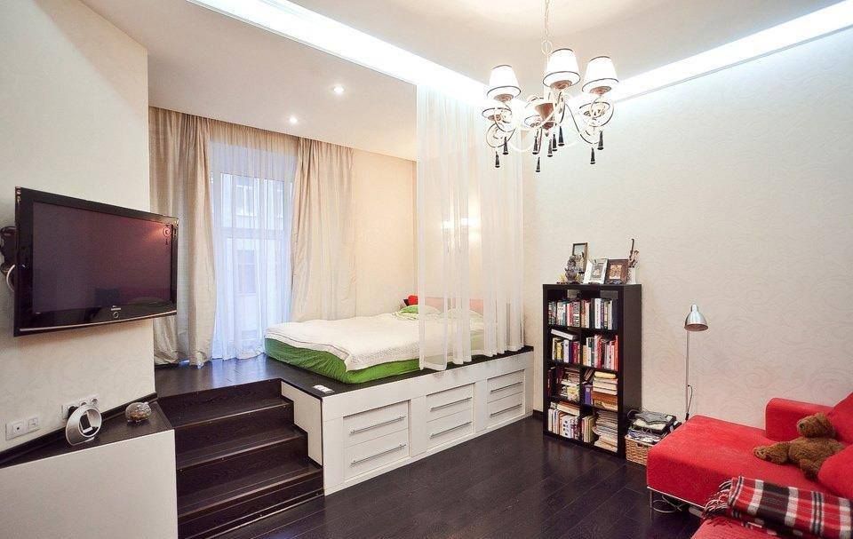 Haut podium avec lit