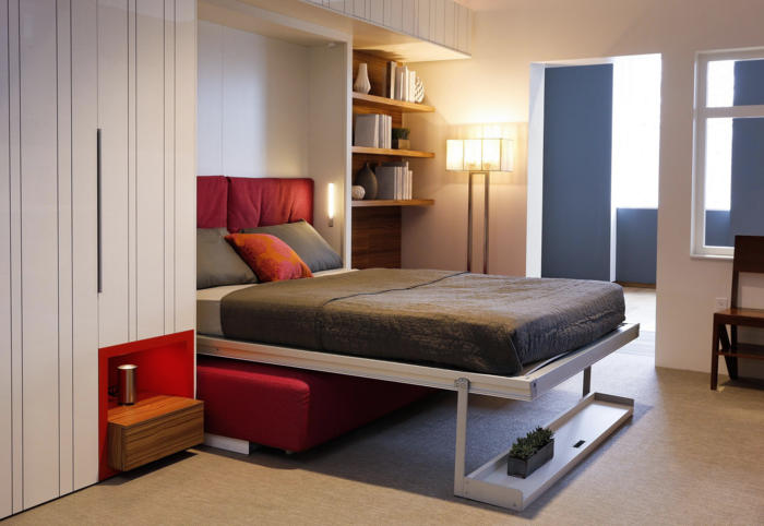 Lit sur une structure en métal