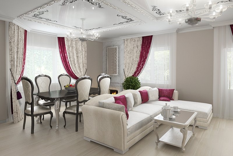 Au centre de la pièce se trouve un canapé d'angle avec des coussins rouges.