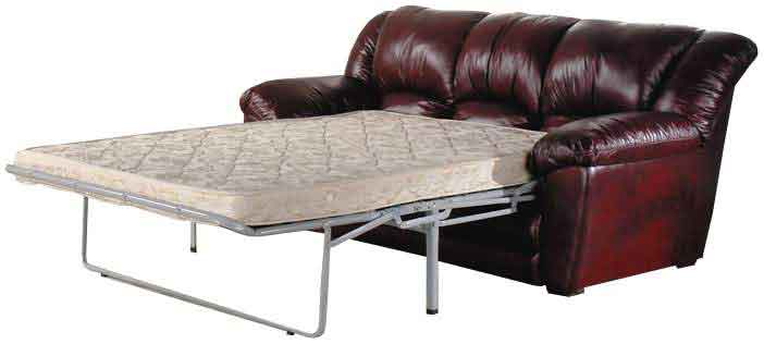 Matelas sur canapé-lit en cuir marron